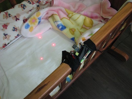 <strong>Laser Baby</strong> Three lasers create point sources of light that are tracked by a Wiimote to ensure the baby is breathing. 